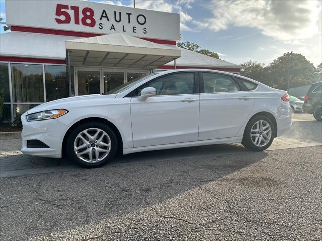 used 2015 Ford Fusion car, priced at $10,999