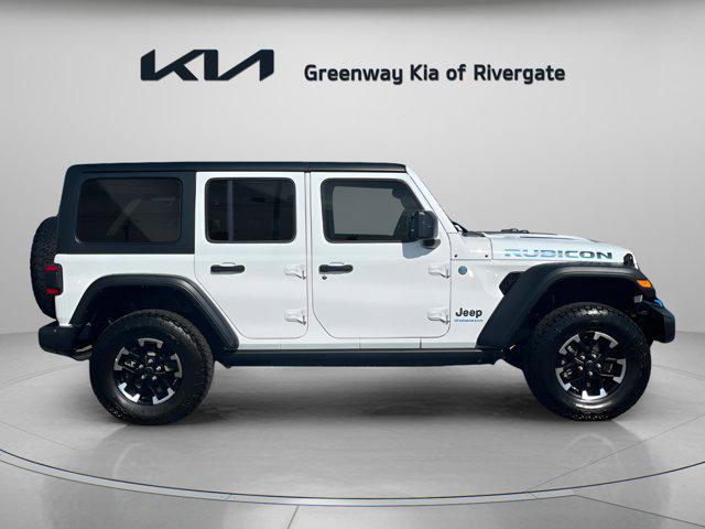 used 2024 Jeep Wrangler 4xe car, priced at $38,875