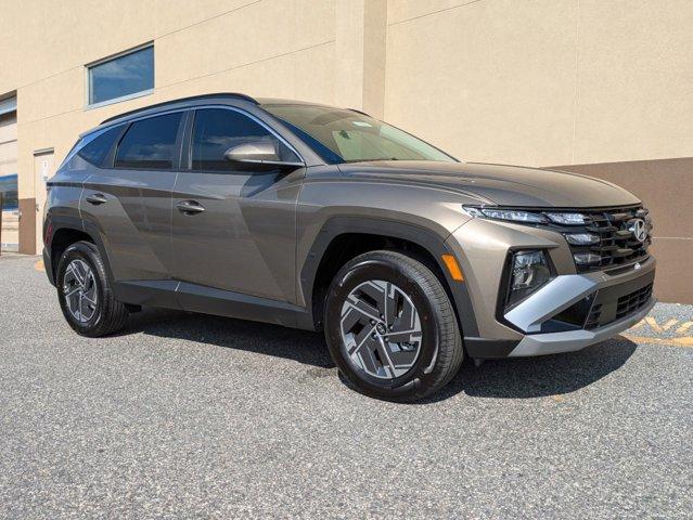 new 2025 Hyundai TUCSON Hybrid car, priced at $33,417