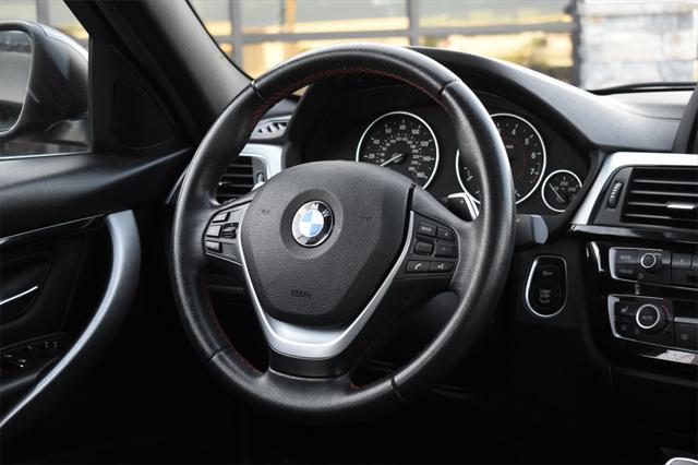 used 2018 BMW 330 car, priced at $18,781