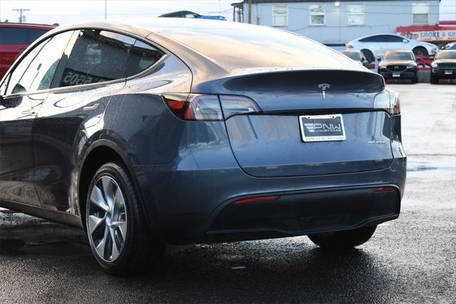 used 2023 Tesla Model Y car, priced at $33,980