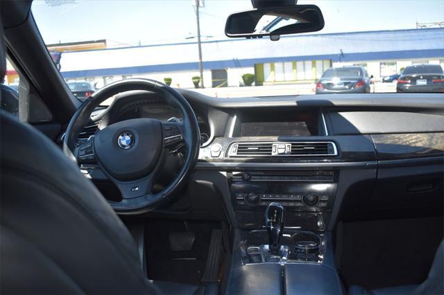 used 2015 BMW 750 car, priced at $16,790