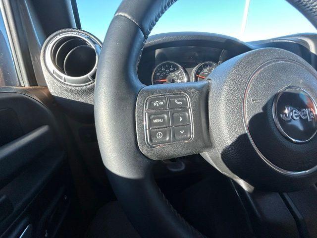 used 2015 Jeep Wrangler Unlimited car, priced at $21,900