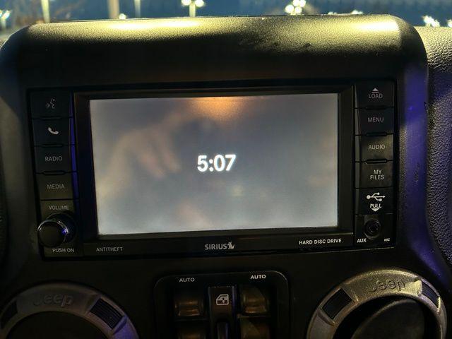 used 2014 Jeep Wrangler Unlimited car, priced at $16,000