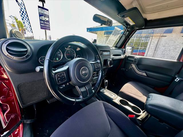 used 2013 Jeep Wrangler Unlimited car, priced at $18,995
