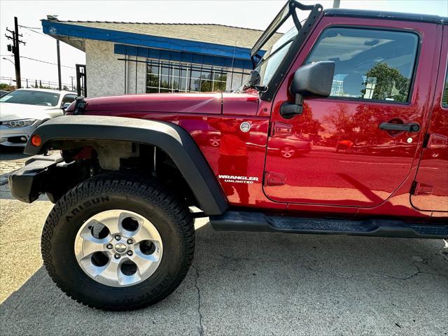 used 2013 Jeep Wrangler Unlimited car, priced at $18,995