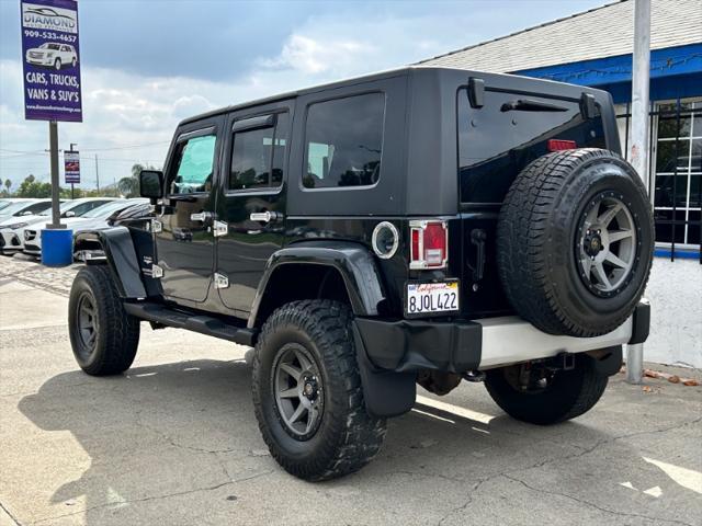 used 2010 Jeep Wrangler Unlimited car, priced at $16,995