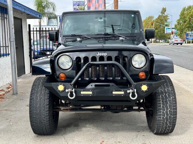 used 2010 Jeep Wrangler Unlimited car, priced at $16,995