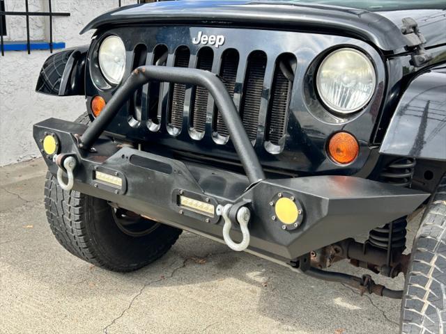 used 2010 Jeep Wrangler Unlimited car, priced at $16,995