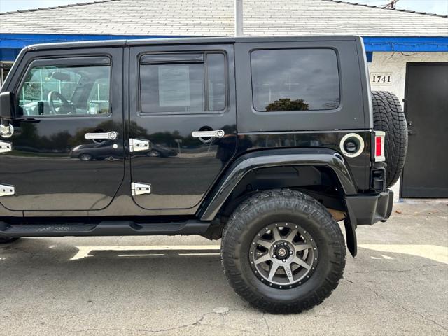 used 2010 Jeep Wrangler Unlimited car, priced at $16,995