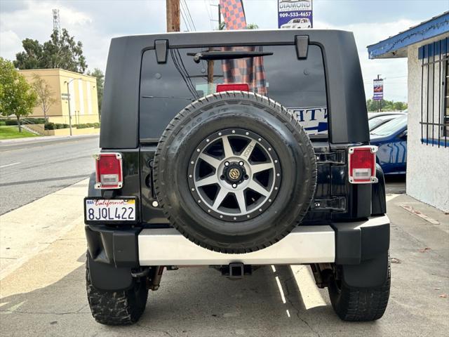 used 2010 Jeep Wrangler Unlimited car, priced at $16,995