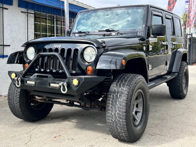 used 2010 Jeep Wrangler Unlimited car, priced at $16,995