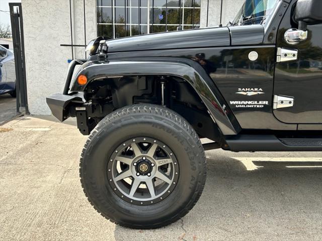 used 2010 Jeep Wrangler Unlimited car, priced at $16,995