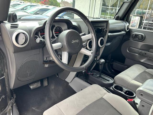 used 2010 Jeep Wrangler Unlimited car, priced at $16,995