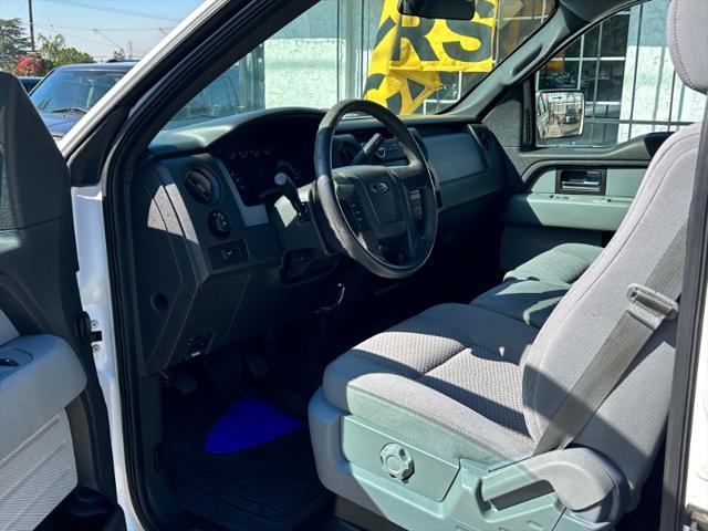 used 2013 Ford F-150 car, priced at $15,000