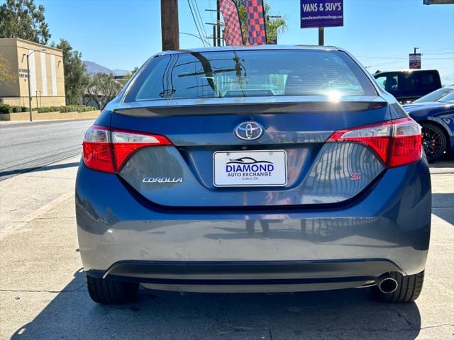 used 2014 Toyota Corolla car, priced at $14,000