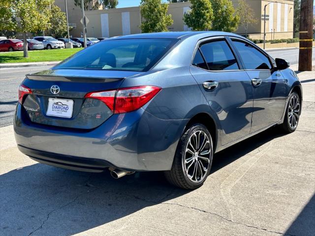 used 2014 Toyota Corolla car, priced at $14,000