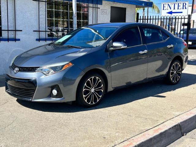 used 2014 Toyota Corolla car, priced at $14,000