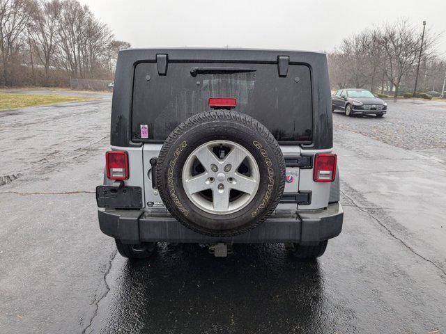 used 2015 Jeep Wrangler Unlimited car, priced at $15,999