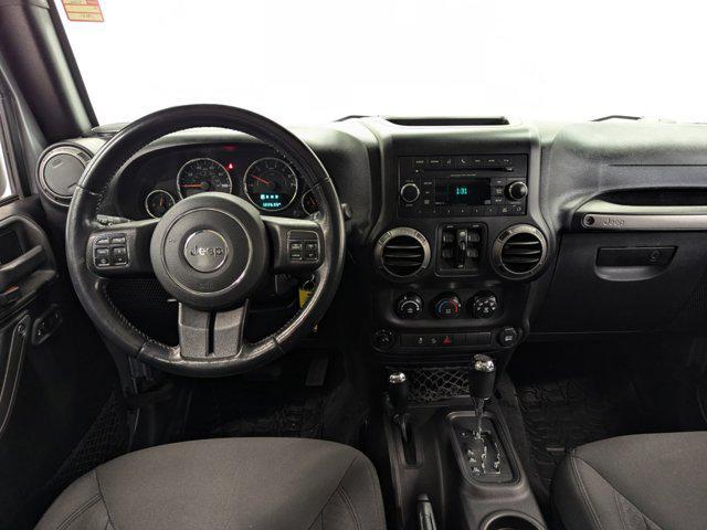 used 2015 Jeep Wrangler Unlimited car, priced at $14,497