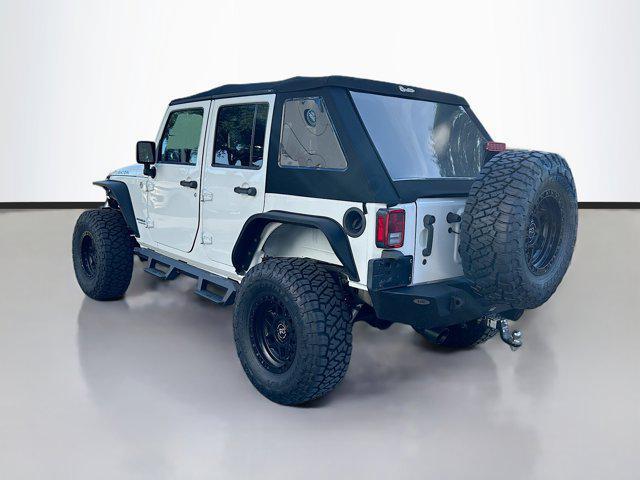 used 2015 Jeep Wrangler Unlimited car, priced at $24,998