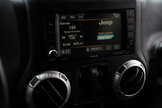 used 2015 Jeep Wrangler car, priced at $22,740