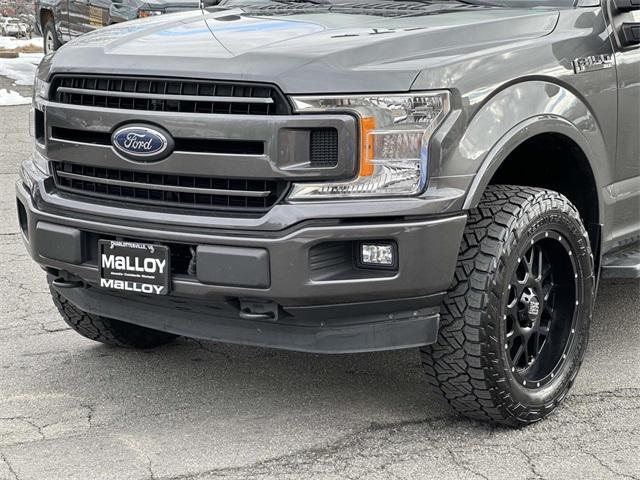 used 2018 Ford F-150 car, priced at $26,123