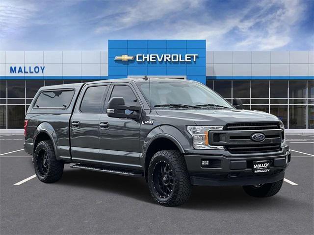 used 2018 Ford F-150 car, priced at $26,123