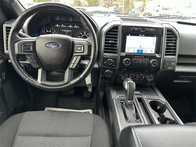 used 2018 Ford F-150 car, priced at $26,123