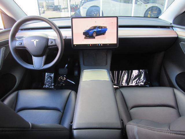 used 2023 Tesla Model Y car, priced at $33,888