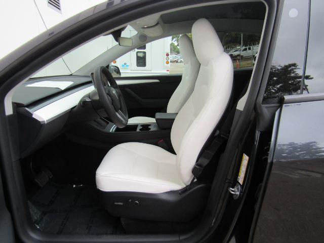 used 2024 Tesla Model Y car, priced at $33,900