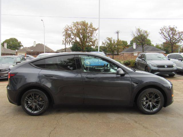 used 2024 Tesla Model Y car, priced at $33,900