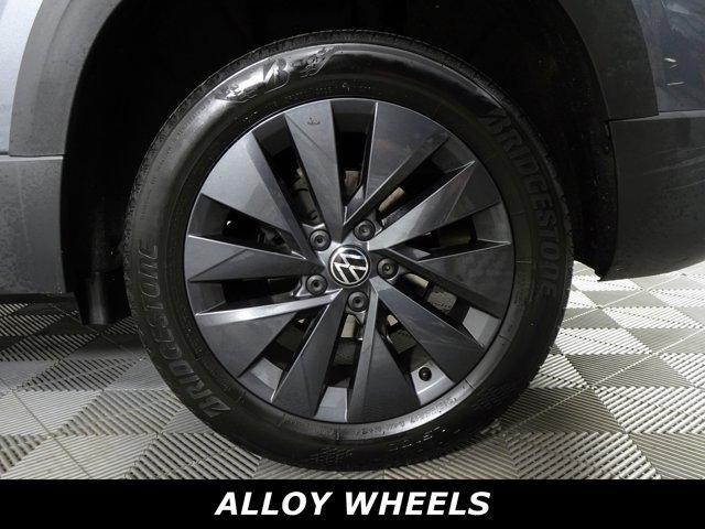 used 2023 Volkswagen Taos car, priced at $18,599