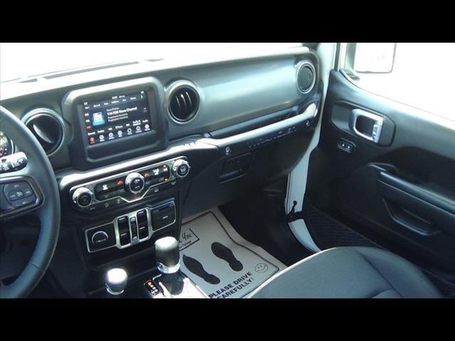 used 2023 Jeep Wrangler car, priced at $38,488