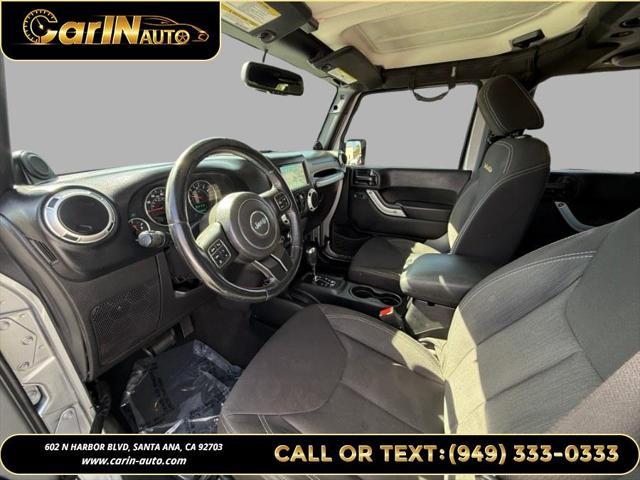 used 2014 Jeep Wrangler Unlimited car, priced at $17,990