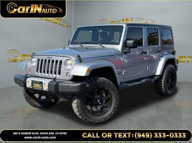 used 2014 Jeep Wrangler Unlimited car, priced at $17,990