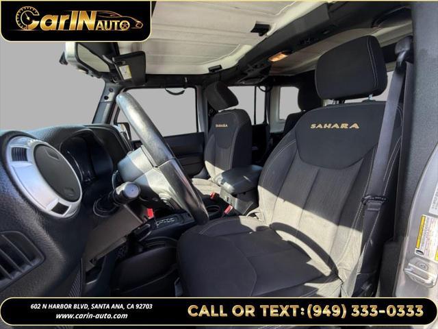 used 2014 Jeep Wrangler Unlimited car, priced at $17,990