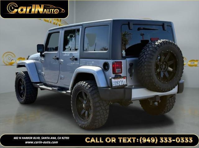 used 2014 Jeep Wrangler Unlimited car, priced at $17,990