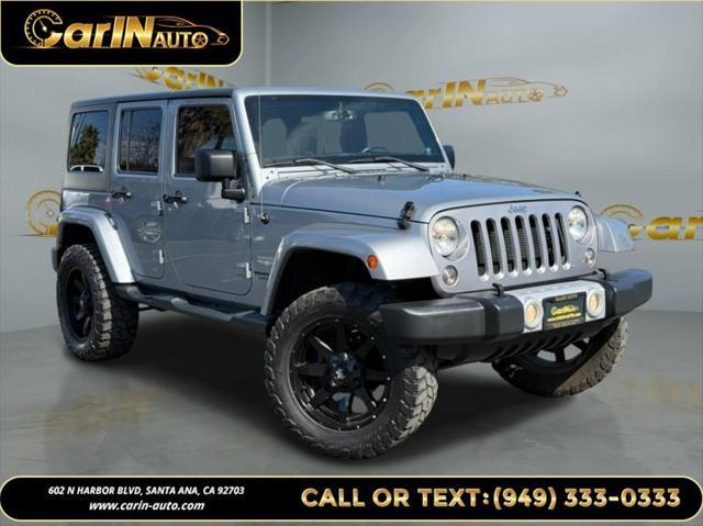 used 2014 Jeep Wrangler Unlimited car, priced at $17,990