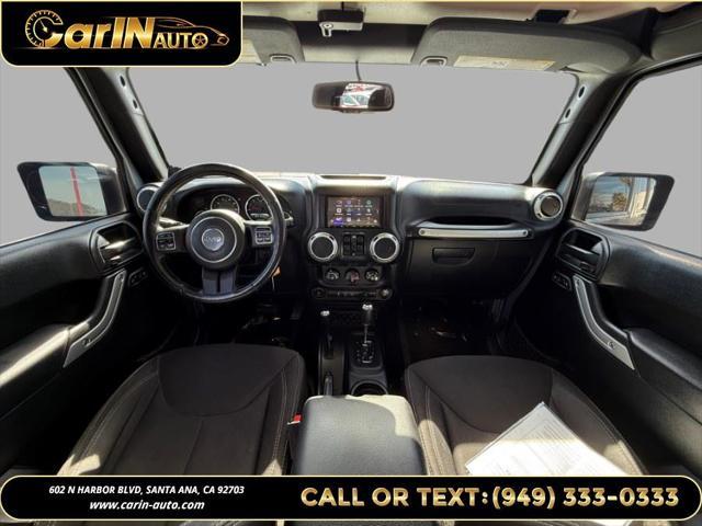 used 2014 Jeep Wrangler Unlimited car, priced at $17,990