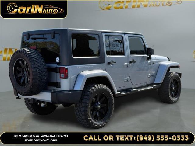 used 2014 Jeep Wrangler Unlimited car, priced at $17,990