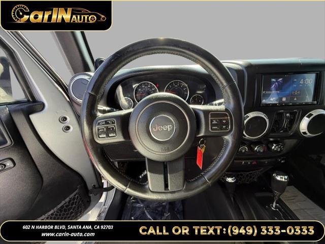 used 2014 Jeep Wrangler Unlimited car, priced at $17,990