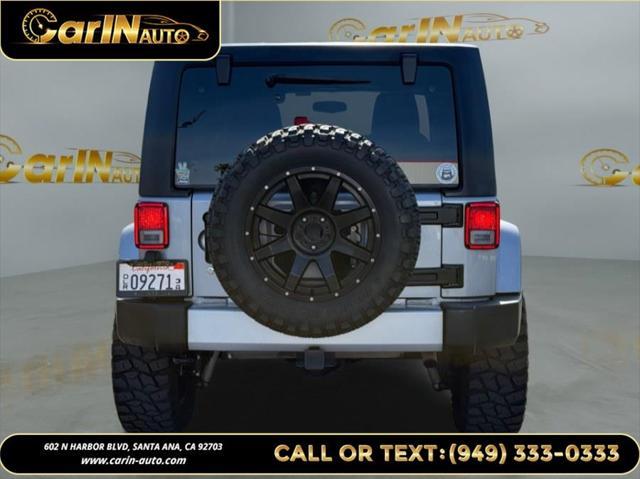 used 2014 Jeep Wrangler Unlimited car, priced at $17,990