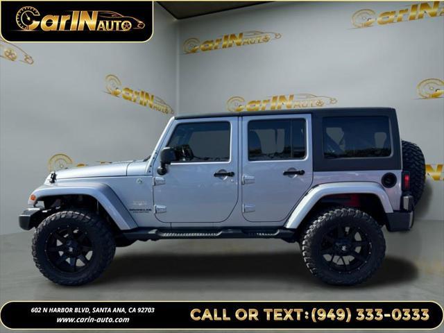 used 2014 Jeep Wrangler Unlimited car, priced at $17,990