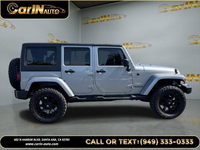 used 2014 Jeep Wrangler Unlimited car, priced at $17,990