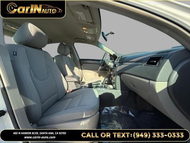 used 2012 Ford Fusion car, priced at $7,500