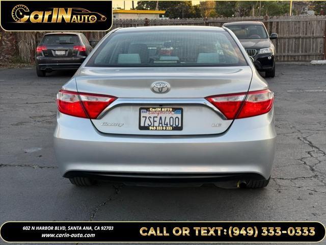 used 2016 Toyota Camry car, priced at $13,990