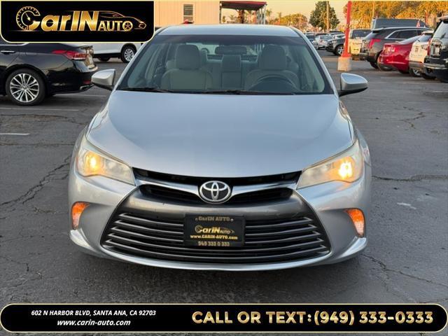 used 2016 Toyota Camry car, priced at $13,990