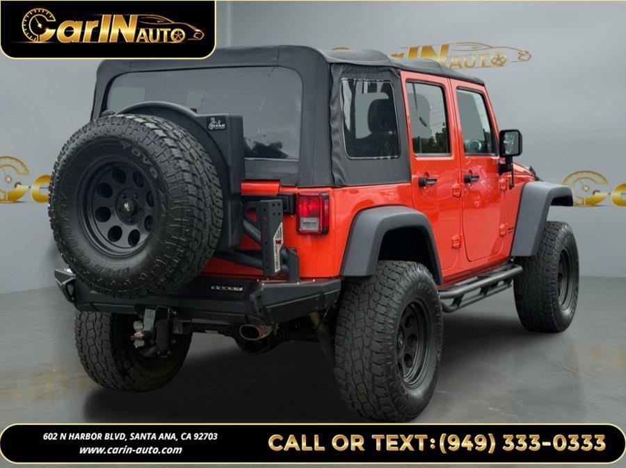 used 2015 Jeep Wrangler Unlimited car, priced at $19,490