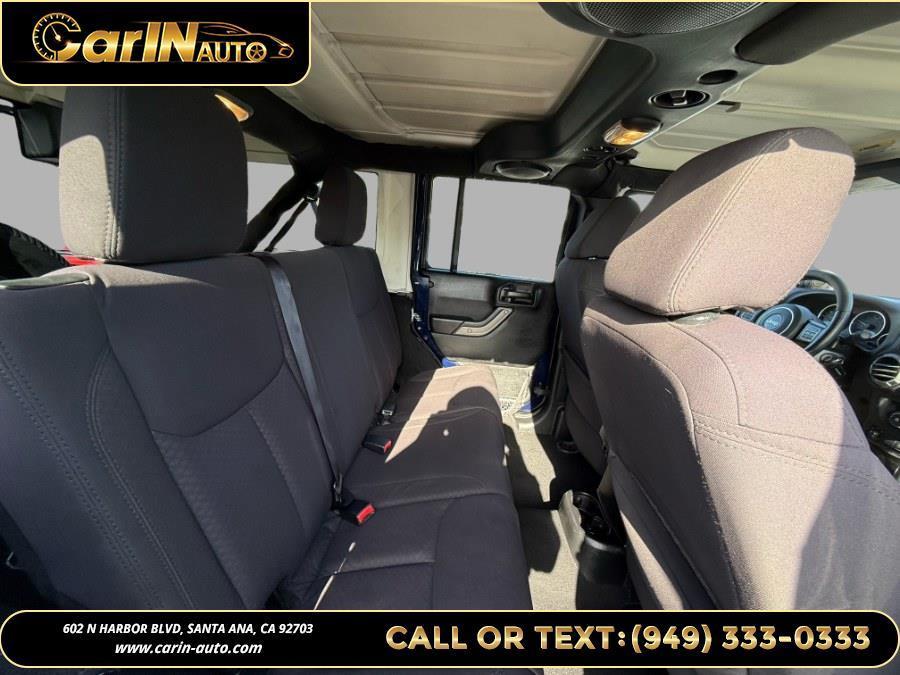 used 2013 Jeep Wrangler Unlimited car, priced at $14,990